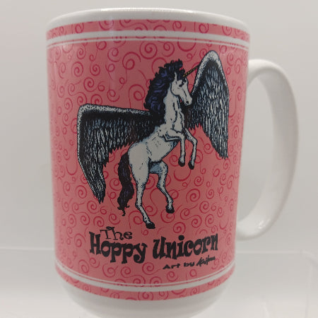 Mug with a unicorn design on a pink patterned background