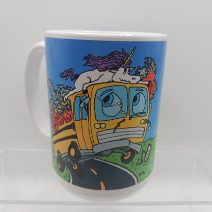 Mug with a colorful design of a unicorn on a school bus against a blue background